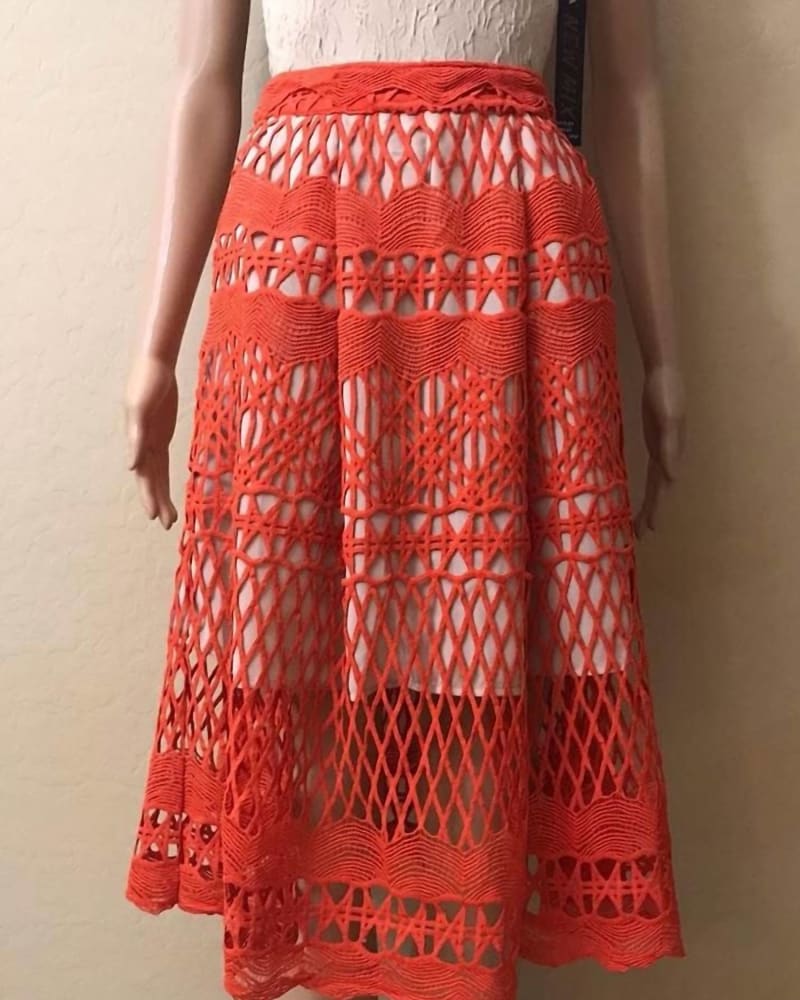 Front of a model wearing a size L Crochet Lace Midi Skirt in Chili in Chili by endless rose. | dia_product_style_image_id:339351